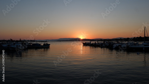 sunset in the harbor © Umut