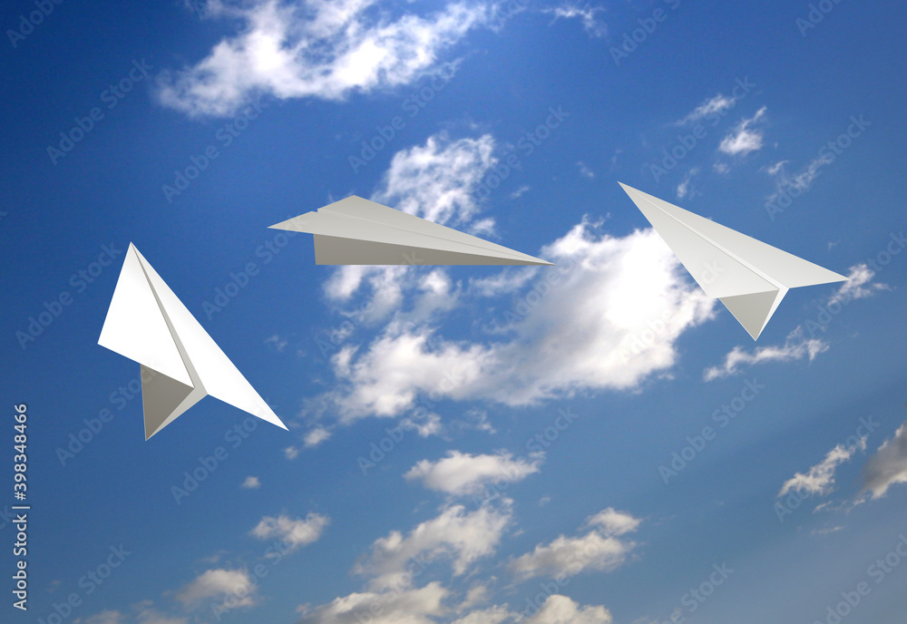 Flying paper planes in the sky
