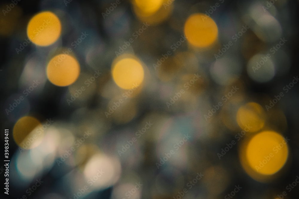 the shine of New Year's lanterns and Christmas tinsel out of focus