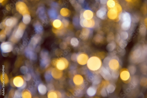 the shine of New Year's lanterns and Christmas tinsel out of focus 