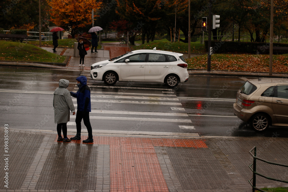 Couple walking in the street Couple walking in the street