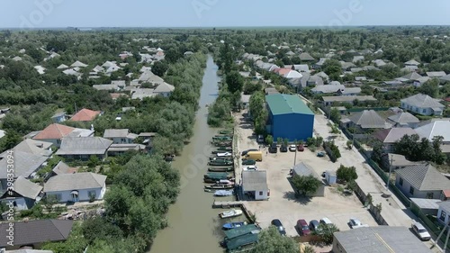 Aerial view on Vilkovo city (Ukrainian Venice, city built on water). (4K-60fps) Vylkove, Danube river, Odessa oblast, Ukraine photo