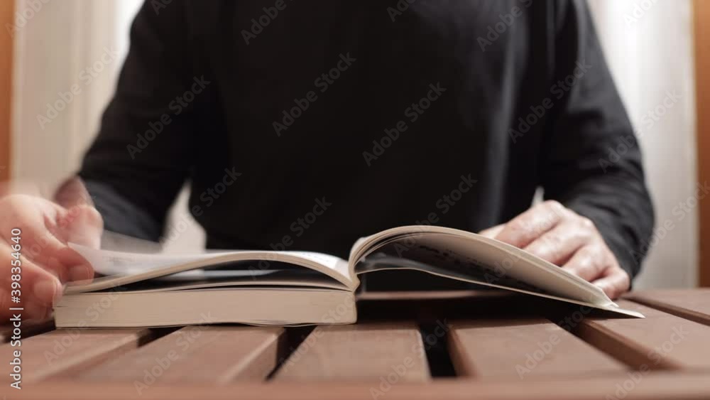 Time lapse: Attractive caucasian man is studying for university. Indoor shoot of young boy, that studies. Study for success and learning concept. Closeup shot of hands in 4k Time lapse: Attractive caucasian man is studying for university. Indoor shoot of young boy, that studies. Study for success and learning concept. Closeup shot of hands in 4k