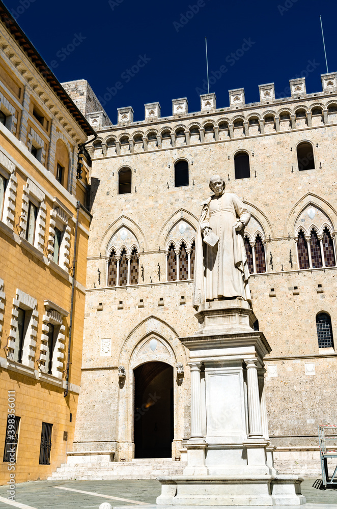 Monument to Sallustio Bandini and Palazzo Salimbeni in Siena - Tuscany, Italy