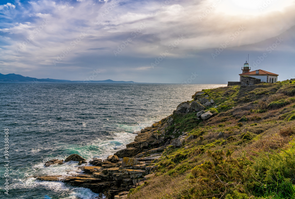 the Monte Louro Lighthouse at the Punta Carreiro in Galicia