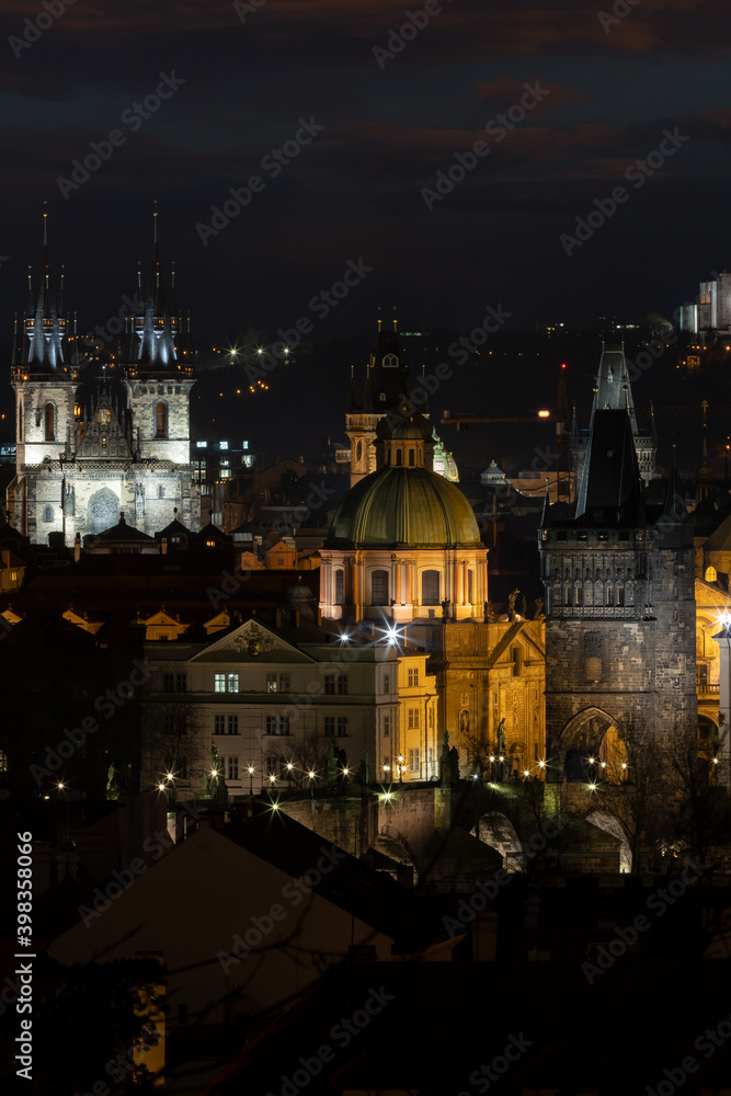 
view of the old Prague tower and light from street lighting and view of night Prague in the Czech Republic
