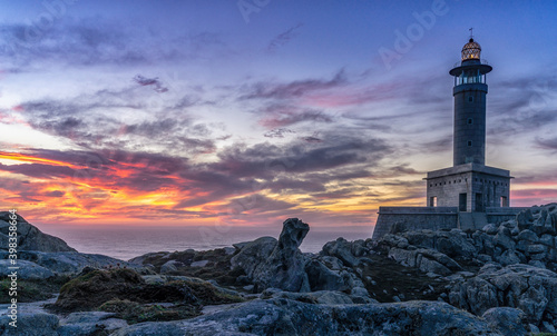 panorama view of the Punta Nariga Lighthouse at sunset