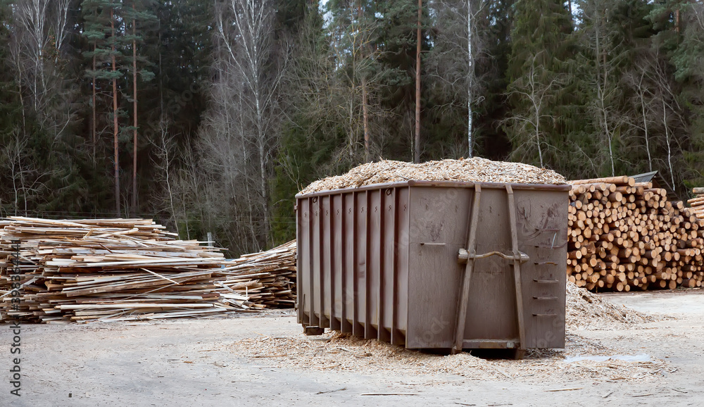 Fototapeta premium A loading container with chips stands at the production site