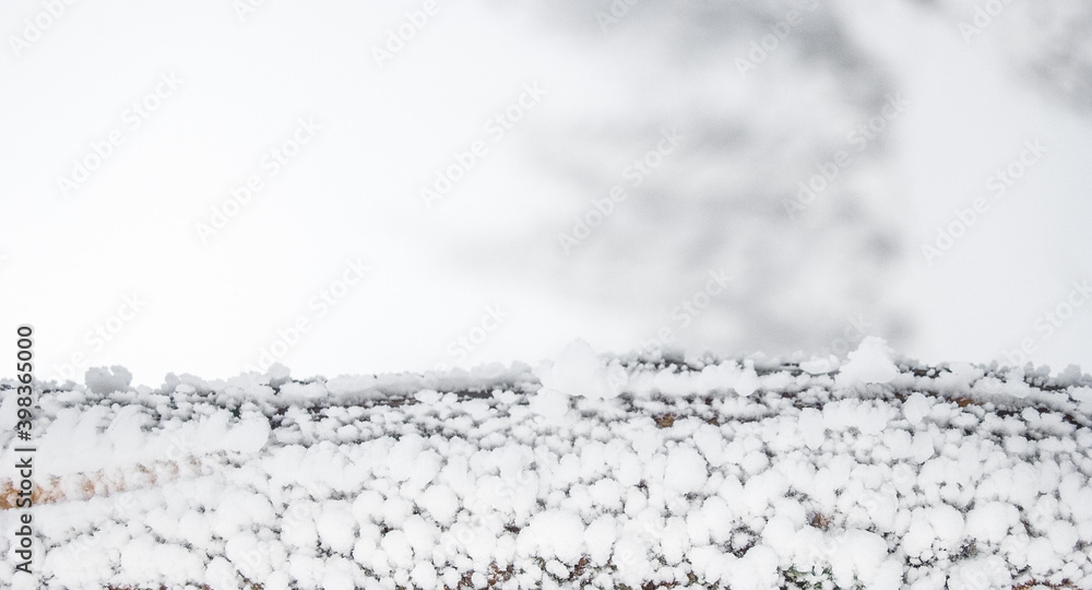 Background with a tree covered with snow and bokeh effect Background with a tree covered with snow and bokeh effect