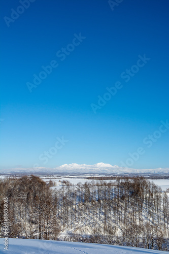 雪山と青空　大雪山旭岳  © kinpouge