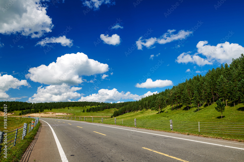 The road on the summer grassland of Hulunbuir of China. The road on the summer grassland of Hulunbuir of China.