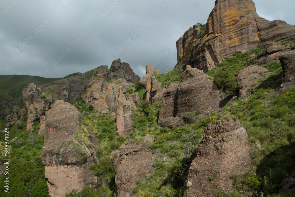 Jurassic landscape. Panorama view of the mountains, green forest and rock formations called Los Terrones, in Cordoba, Argentina. Jurassic landscape. Panorama view of the mountains, green forest and rock formations called Los Terrones, in Cordoba, Argentina.