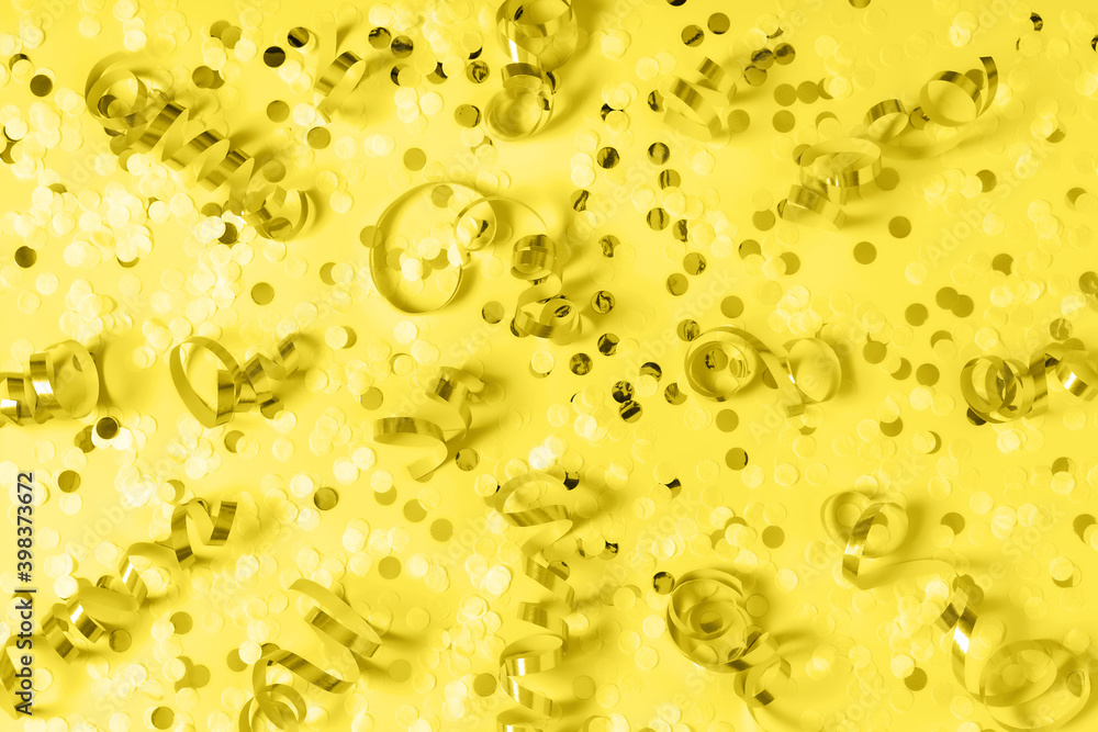 Modern abstract trendy yellow background with round confetti and party streamers. Great design for any purposes. Color 2021 concept. Greeting card. Banner design. Copy space. Modern abstract trendy yellow background with round confetti and party streamers. Great design for any purposes. Color 2021 concept. Greeting card. Banner design. Copy space.