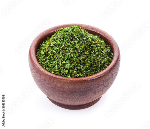 dry thyme in wood bowl on white background