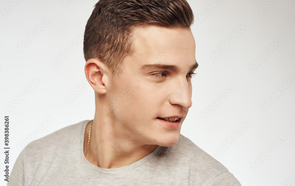 Obraz premium Man in gray t-shirt emotions elegant style their self confidence