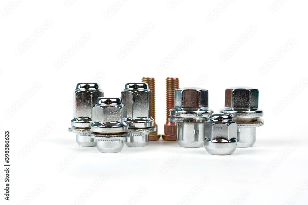several nuts and studs for installing the wheel on the car several nuts and studs for installing the wheel on the car