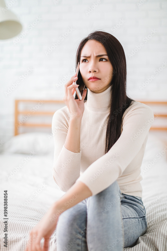 angry young woman talking with friend on mobile phone angry young woman talking with friend on mobile phone