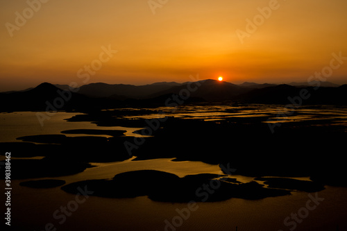 sunset over the lake © Kang Sunghee
