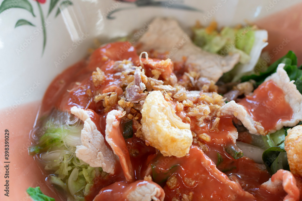 Yen Ta Four, Authentic Thai-style noodle soup with fish balls, crispy wonton skin, and special homemade red sauce. Thai Style Noodle with assorted tofu and fish ball in Red Soup. Yen Ta Four, Authentic Thai-style noodle soup with fish balls, crispy wonton skin, and special homemade red sauce. Thai Style Noodle with assorted tofu and fish ball in Red Soup.