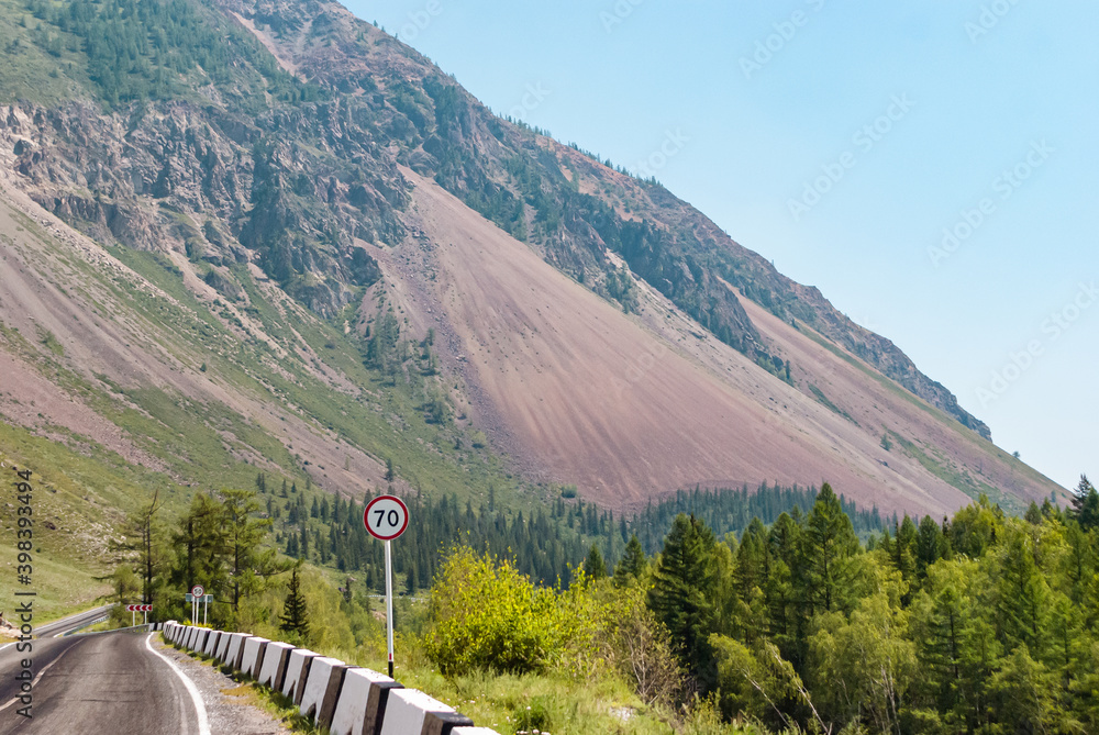 Countryside road in the valley. Altay mountains, Russia
