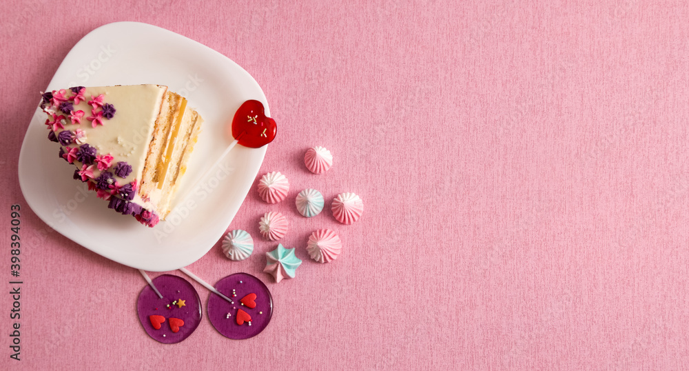 piece of cake on a plate on pink background, heart shaped lollipops, copy space, banner piece of cake on a plate on pink background, heart shaped lollipops, copy space, banner