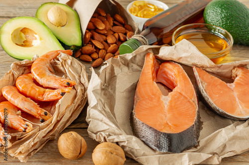 Healthy eating concept. Natural sources of omega 3 acids. Vegetables, seafood, nut and seeds