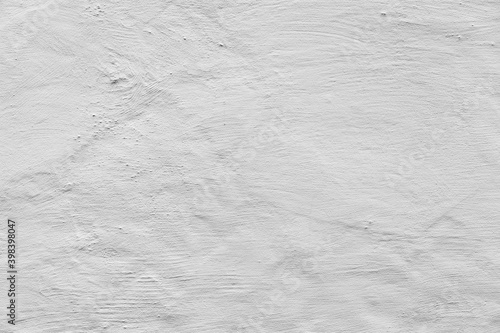 Grungy old concrete wall with white stucco texture © evannovostro