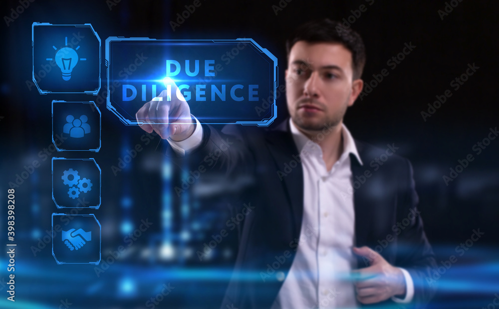 Business, Technology, Internet and network concept. Young businessman working on a virtual screen of the future and sees the inscription: Due diligence Business, Technology, Internet and network concept. Young businessman working on a virtual screen of the future and sees the inscription: Due diligence