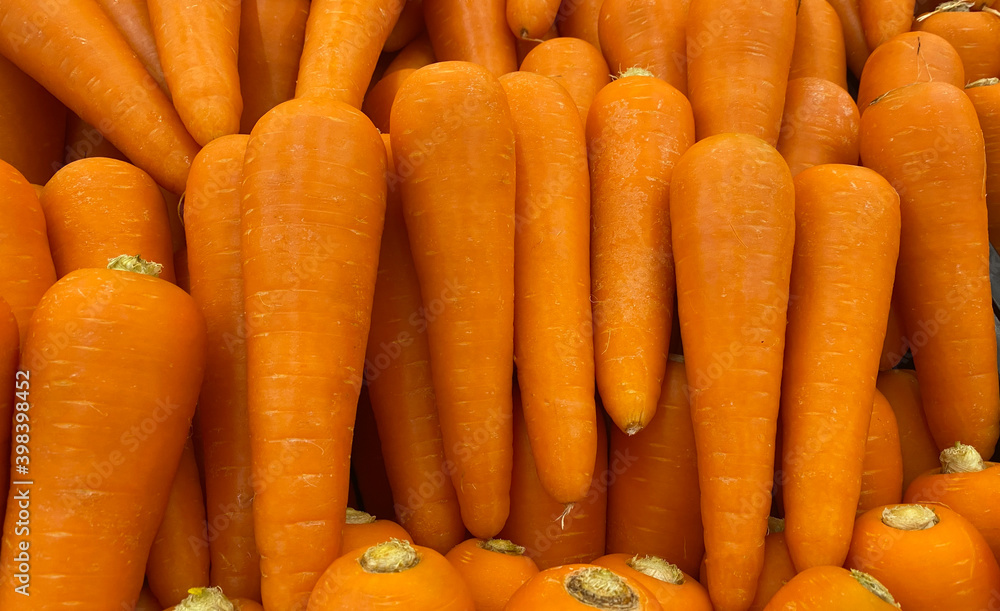 closeup fresh carrots in the supermarket closeup fresh carrots in the supermarket