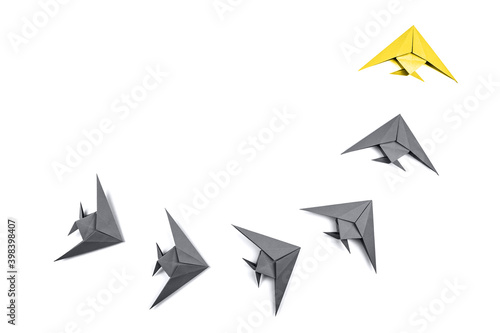 Paper origami fishes isolated on white background.