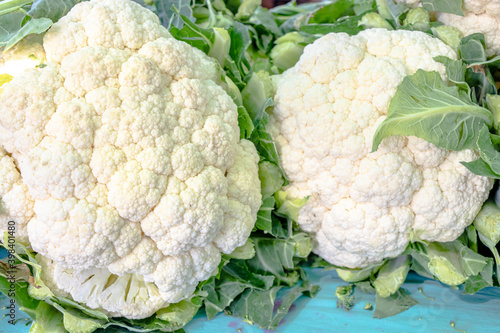 white cauliflower with green leaves