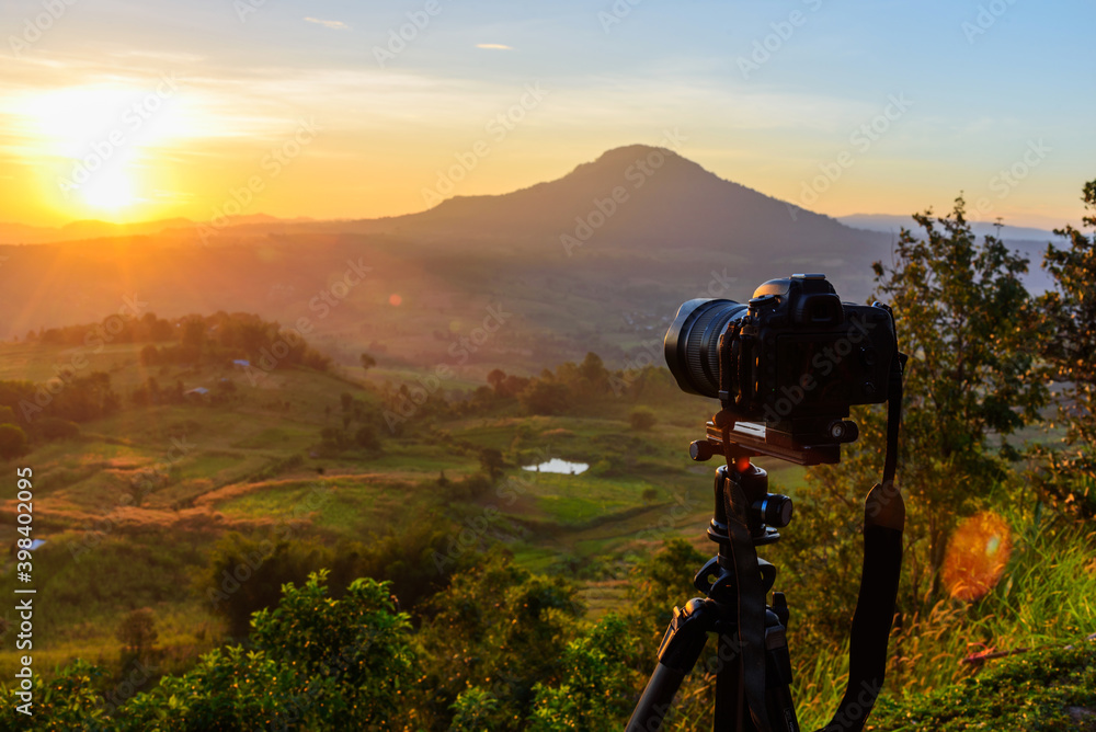 Photographer take the photo at high mountain in sunrise time