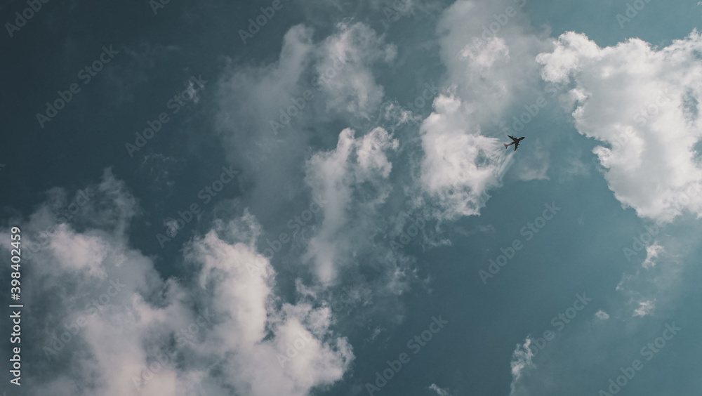 Naklejka premium flying over the clouds 