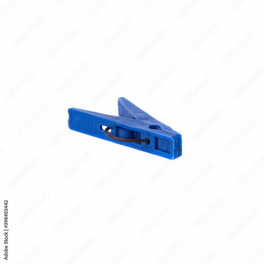 Blue plastic clothespin isolated on a white background Blue plastic clothespin isolated on a white background