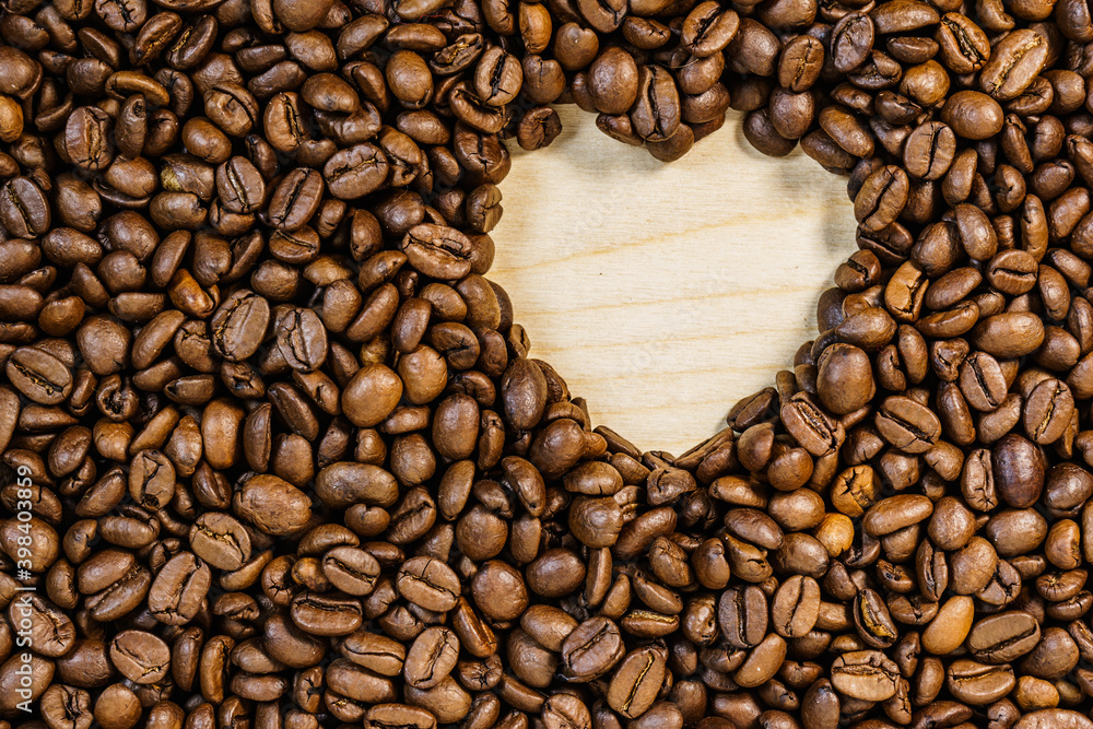 Roasted coffee beans with heart form Roasted coffee beans with heart form