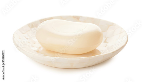 Dish with soap on white background