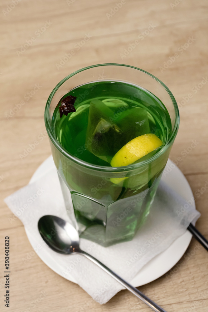 Green drink in a glass. Bartender making cocktail. Green drink in a glass. Bartender making cocktail.