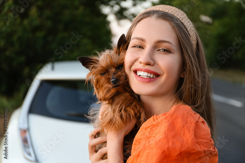 Woman with cute dog near mo...