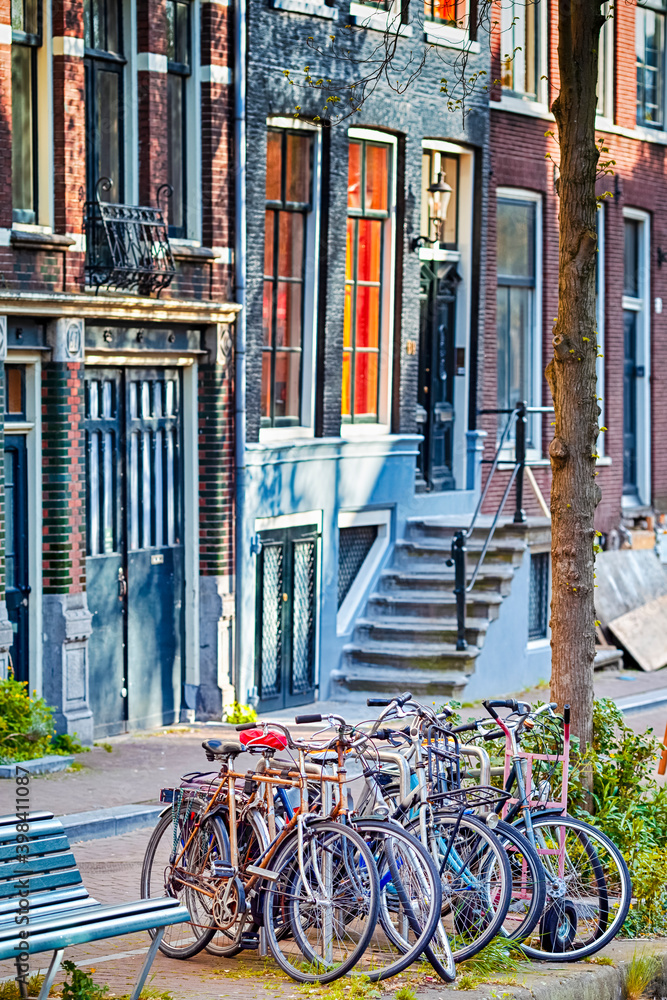 Holland Traveling. Line of Traditional Bicycles in Amsterdam in the Netherlands. Holland Traveling. Line of Traditional Bicycles in Amsterdam in the Netherlands.