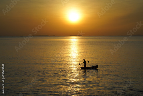 fishing boat at sunset © sarawut