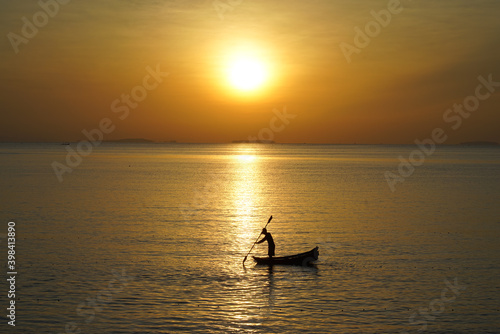 morning sun with fishermen at sea © sarawut