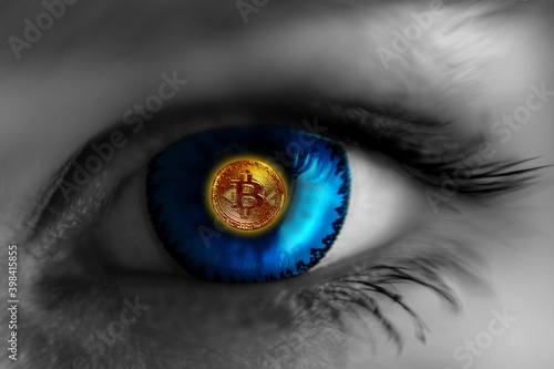 gold coin bitcoin in the eye