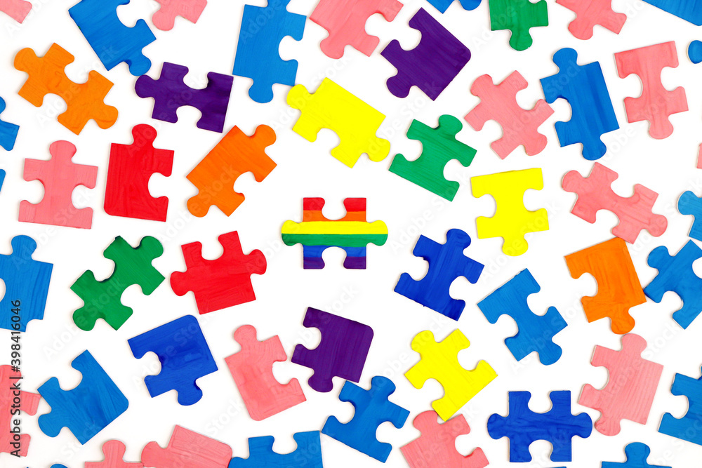 LGBT concept. Rainbow colored puzzle isolated on white background. Gay Pride. Concept of equality, acceptance of sexual minorities lesbian, gay, bisexual, transgender LGBT concept. Rainbow colored puzzle isolated on white background. Gay Pride. Concept of equality, acceptance of sexual minorities lesbian, gay, bisexual, transgender