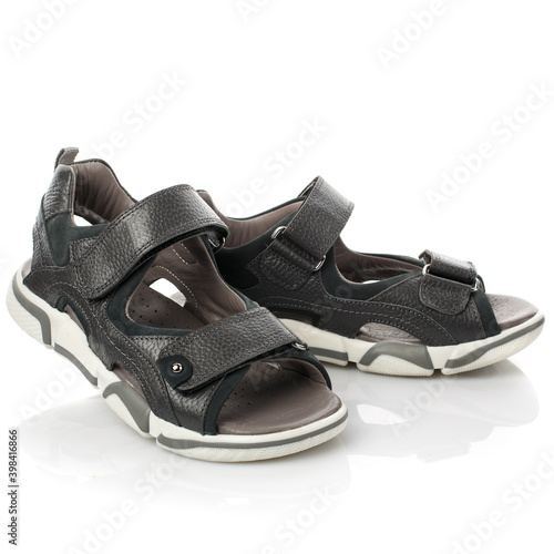 Stylish gray baby sandals for a boy on a white background.