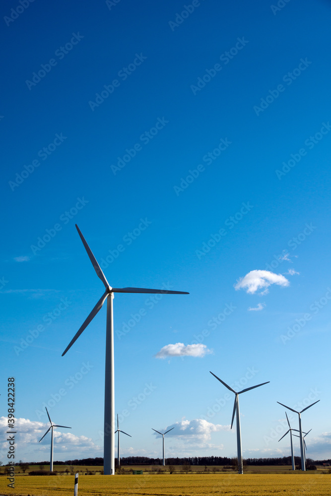 An agricultural field in Northern Germany with wind turbines. An agricultural field in Northern Germany with wind turbines.