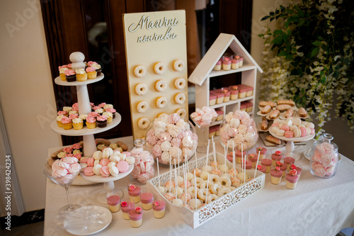 a beautiful table with sweets and various cakes general plan
