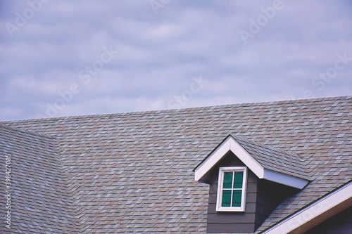Fotografi Roof top with dormer window.