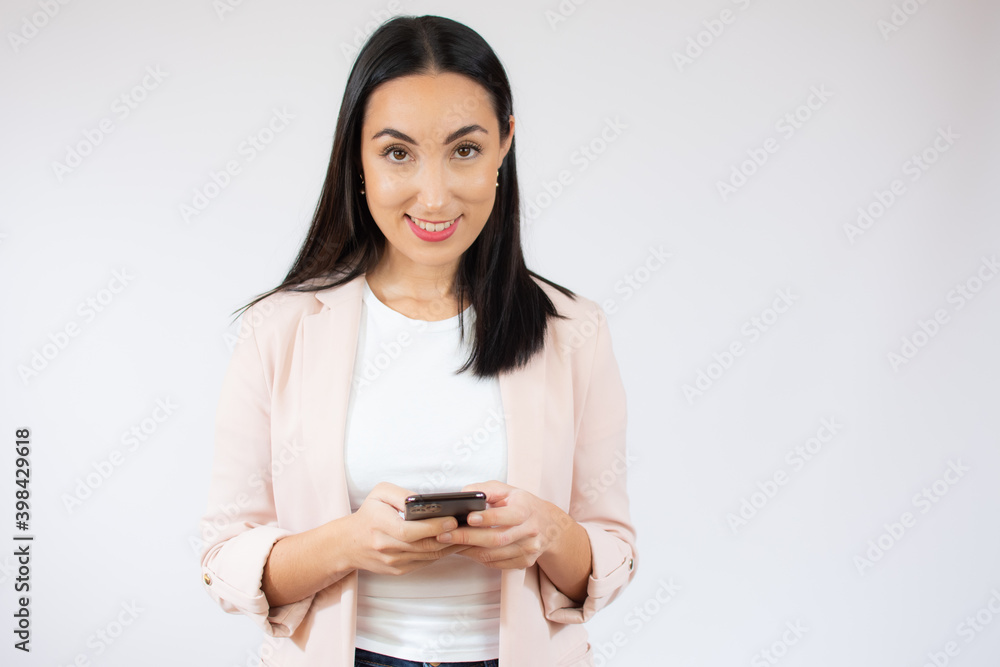 Portrait of a happy young business woman using mobile phone isolated over white background Portrait of a happy young business woman using mobile phone isolated over white background