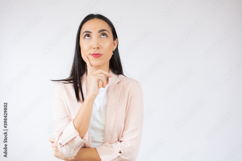 Young beautiful business woman isolated background confuse and wondering about question. Uncertain with doubt, thinking with fingers on face. Pensive concept. Young beautiful business woman isolated background confuse and wondering about question. Uncertain with doubt, thinking with fingers on face. Pensive concept.