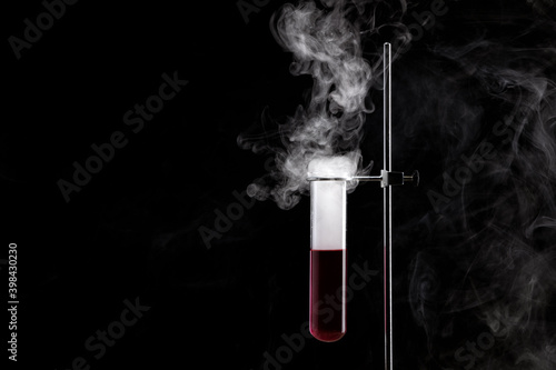 Chemical reaction in flask glass in labolatory. The concept of scientific experiments. Copy space.
 photo